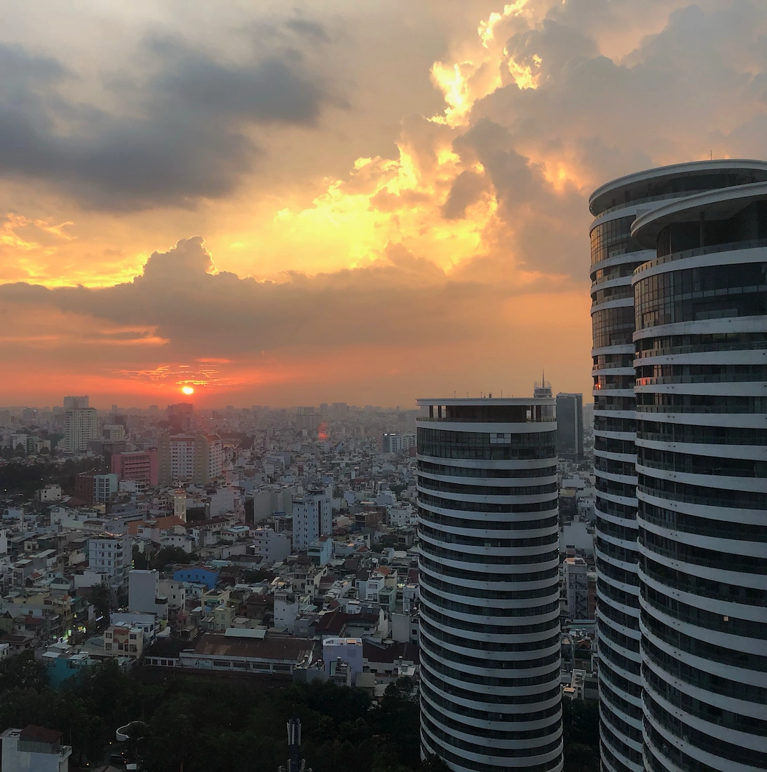 Ho Chi Minh City skyline at sunset from a high-rise in Binh Thanh