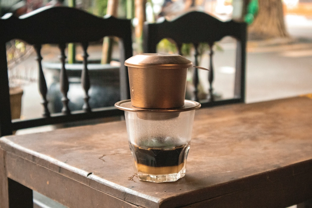 Vietnamese phin drip coffee over condensed milk